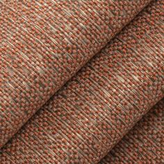 an orange and brown tweed fabric