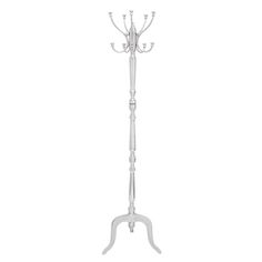 a white coat stand with three candles on it's top and one candle in the middle