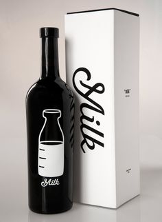 a bottle of wine next to a box on a white surface with the word chill written in black