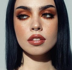 Bottom Lash Eyeliner Looks, Red 70s Makeup, Bold Orange Eye Makeup, Monochrome Eye Makeup, Makeup For Round Eyes Eyeshadows, 70s Inspired Wedding Makeup, Dark Orange Eyeshadow Looks, Rust Colored Makeup, Black And Orange Makeup Looks