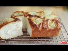 some bread that is sitting on a wire rack