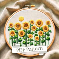 a cross stitch pattern with sunflowers and the words pdf pattern on it