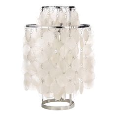 three tiered table lamp with white glass beads on the bottom and silver metal base