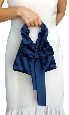 Navy navy blue bag knot satin bag purse, wedding bow bag, party nandbag, elegant clutch,Handmade bag for event party, Satin Evening Bag Gift I invite you to check out this charming handbag for women, which is made of exquisite satin (satin) and is designed to emphasize your unique beauty and elegance.  This handbag is ideal for those who value quality and style.  Features:  * Material: satin (satin)  * Fastener: metal button fastener  * Dimensions: width 23 cm / 9 inches, height 18 cm / 7 inches Chic Party Bag With Ribbon Detail, Chic Party Bag With Ribbon, Elegant Bag With Ribbon For Gift, Elegant Bags With Decorative Bow, Elegant Wedding Bags With Bow Detail, Elegant Wedding Bags With Bow, Elegant Bags With Bow For Party, Elegant Bags With Bow For Events, Elegant Clutch Bag With Bow