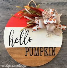 a wooden sign that says hello pumpkin on it