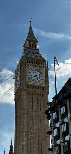 the big ben clock tower towering over the city of london