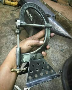 a person is working on a metal object