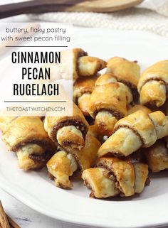 cinnamon pecan rugelach on a white plate