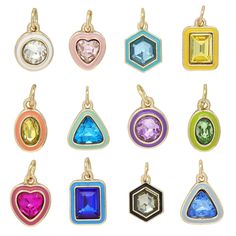 six different colored pendants on a white background