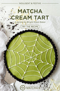 an advertisement for matcha cream tart with spider webs on the front and side