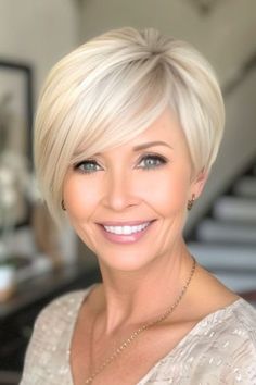 Asymmetrical Pixie Hairstyle on smiling older woman with blonde hair. Short Hair For Older Women, Pixie 2024, Asymetrical Haircut, Short Gray Hair, Fine Haircuts, Short Asymmetrical Hairstyles, Short Asymmetrical Haircut, Woman With Blonde Hair, Short Haircuts For Older Women