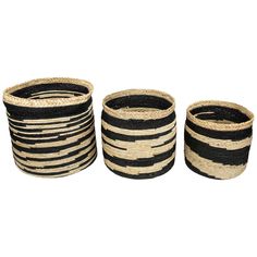 four black and white baskets stacked on top of each other