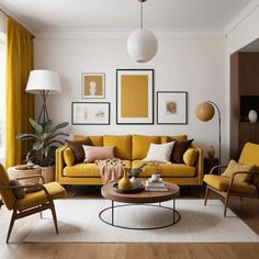 a living room filled with yellow furniture and pictures on the wall above it's coffee table