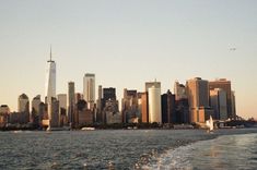 the skyline of new york city is seen from across the water