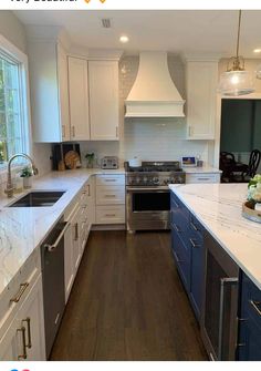 a large kitchen with white cabinets and blue counter tops is featured in this postcard