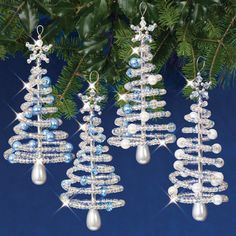 DIY beaded ornament kit - frosty Christmas Trees.... spiral-design tiny trees with real crystal, pearlized glass, and seed beads. The silvery crystals and light blues show beautifully against green Christmas trees. Beaded Tree Ornaments, Beaded Christmas Decorations, Bead Ornaments, Beaded Star, Blue Aurora, Mary Maxim, Crystal Christmas, Bead Projects, Ornament Ideas