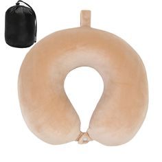 an inflatable travel pillow with a black bag next to it