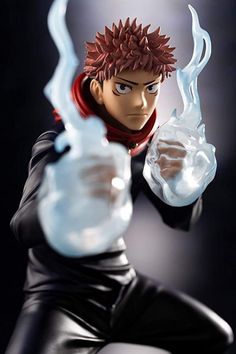 an action figure holding a glass ball in his hand