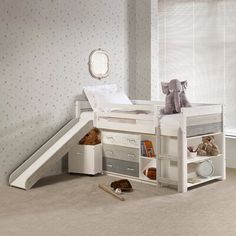 a child's bed with a slide in the corner