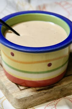 a bowl of soup with a spoon in it