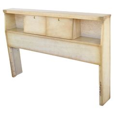 a wooden bench with two drawers on it's sides and one shelf below the bench