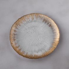 beatriz-ball-glass-radiant-charger-plate-clear-and-gold Gold And Silver Charger Plates, Gold Placemats, Beatriz Ball, Glass Charger Plates, Holiday Lookbook, Entertaining Gifts, Wine Coasters, Fall Entertaining, Charger Plate