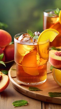 two glasses of iced tea with lemon and mint garnish on a cutting board