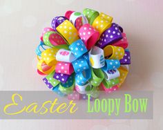 a colorful hair bow with polka dots and bows on it's center is the words easter loopy bow