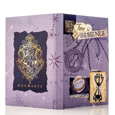 a harry potter book with hogwart's symbols on the front and back cover