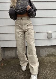 Super comfortable, contrast-stiched cargo pants with elastic back waist, 2 back pockets, 3 front pockets Material: 100% Cotton Model is 5'0 wearing a small Kakhi Cargo Pants, Nude Cargo Pants Outfit, Neutral Cargo Pants, White Cargo Pants Outfit, Outfit Ideas Cargo Pants, Crew Neck Outfit, Girls Cargo Pants, Teen Pants, How To Style Cargo Pants