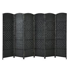 a room divider with four panels on each side