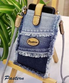 a cell phone case made out of jeans