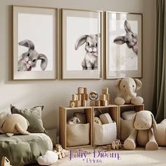 two framed pictures hang on the wall next to stuffed animals in a child's room