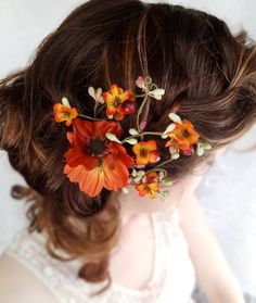 a woman with flowers in her hair