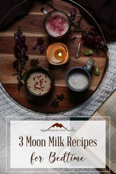 three moon milk recipes for bedtime on a tray with an open book and candle