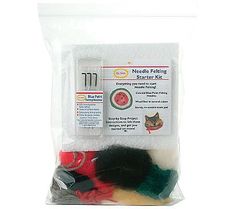 a package of needle felts for cats and kittens