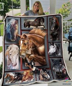 a woman is holding up a blanket with horses on it and the photo has been taken