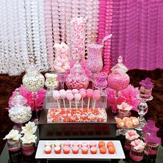 candy bar with pink and white decorations