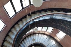 an overhead view of a spiral staircase in a building