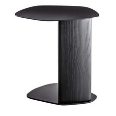 a black table with an oval shaped top