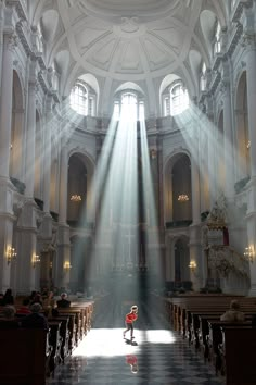 the light shines through the windows in an old church