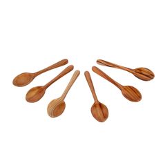 six wooden spoons arranged in the shape of a circle