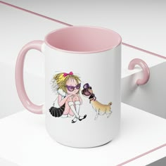 a pink and white coffee mug with a cartoon girl holding a small dog on it