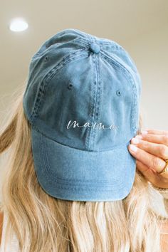 This mama denim hat is perfection and compliments any outfit! Made out of 100% cotton, the 6-panel cap offers a light feel, while the adjustable strap ensures a solid and comfortable fit. * 100% cotton * 6 sewn eyelets * 4 rows of visible stitching on the visor * Adjustable strap * Head circumference: 21.65″-25.19″ (55 cm-64 cm) Note that no refunds or exchanges can be made since we custom create each hat when ordered. Thank you for choosing MistyPaperCo! If you have any questions, please reach out before your purchase:) © Copyright Misty Paper Co. LLC. All Rights Reserved. This product is made especially for you as soon as you place an order, which is why it takes us a little bit longer to deliver it to you. Making products on demand instead of in bulk helps reduce overproduction, so than Mama Hat, Mama Jeans, Visible Stitching, 6 Panel Cap, Embroidered Hat, Denim Hat, Mama Gifts, Embroidered Hats, Baseball Hat