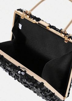 Add a touch of glamour to your evening attire with the Black Sequin Square Evening Bag. The elegant gold top handle adds a sophisticated touch, while the detachable chain shoulder strap offers versatility. Perfect for special occasions and formal events. Glamorous Evening Bags With Detachable Handle, Glamorous Top Handle Shoulder Bag For Night Out, Glamorous Evening Bag With Gold-tone Hardware, Rectangular Gala Bag With Gold-tone Hardware, Rectangular Gala Bags With Gold-tone Hardware, Luxury Evening Bag With Gold-tone Hardware For Party, Elegant Bags With Gold-tone Hardware For Gala, Party Evening Bag With Chain Strap And Top Handle, Rectangular Bags With Gold-tone Hardware For Gala