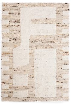 an area rug with squares and rectangles in white, beige and brown colors