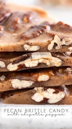 a stack of pecan brittle candy on top of a white plate