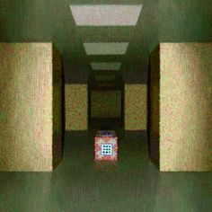 an image of a cube in the middle of a hallway