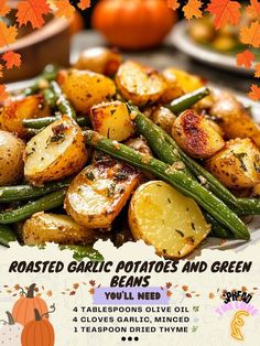 roasted garlic potatoes and green beans are served on a white plate with autumn leaves in the background