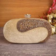 *Pre-order only (4 weeks processing time from placing an order)* A soft blend of regal luxury, this gorgeous velvet clutch is embellished with sequins and stones and is perfectly sized to carry your essentials. Whether it is a wedding, party or social event, grab this stunning clutch to accessorise your outfit. With one main compartment and a magnetic fastening, this clutch is completed with a chain strap which can be worn as a shoulder bag or tucked in for a clutch style. Dimensions: 20cm x 12cm x 5cm Velvet Clutch, Social Event, Social Events, Clutch Handbag, Chain Strap, Evening Bags, Purses And Handbags, A Wedding, Pre Order